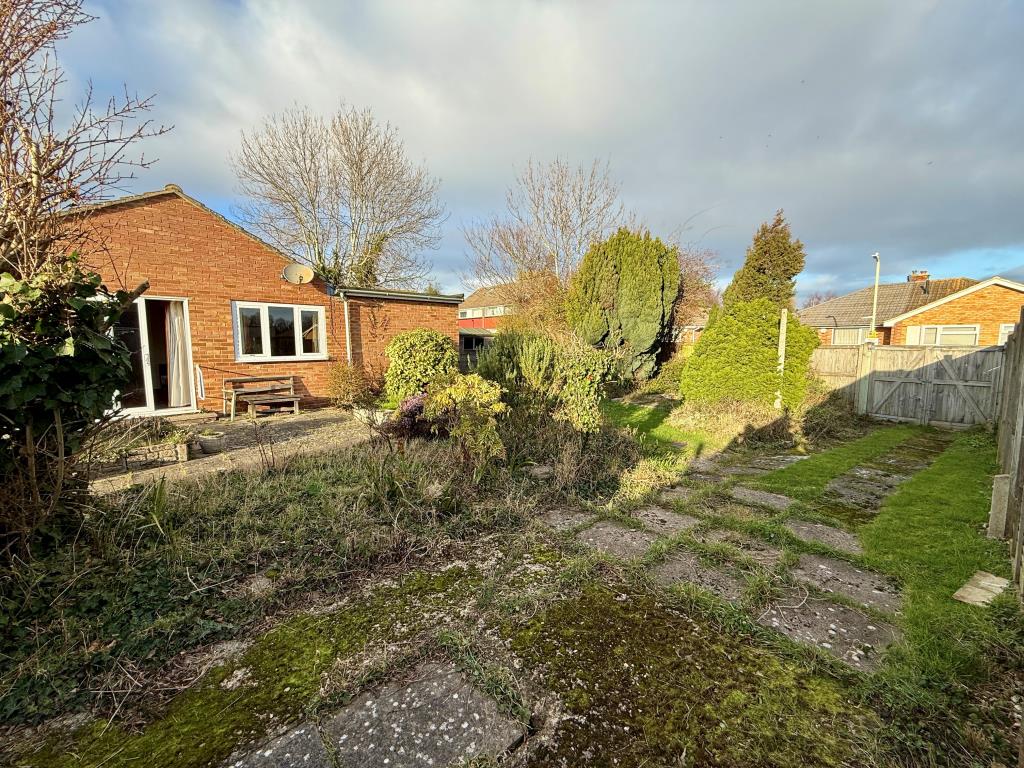 Lot: 153 - FOUR-BEDROOM BUNGALOW FOR REFURBISHMENT AND REPAIR - View of double gates